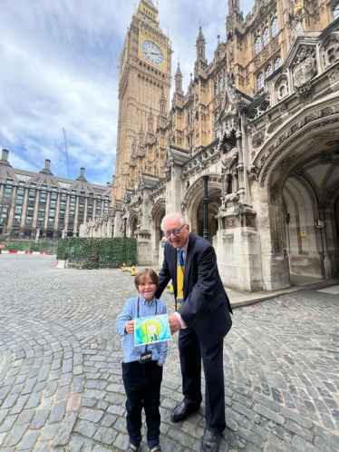 Sir Peter meeting the winner of the 'Christmas Card to the King' competition