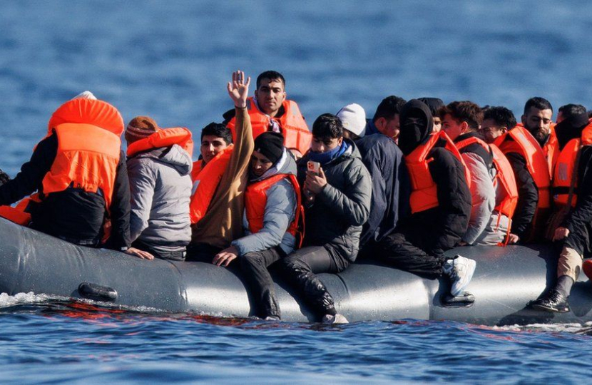 People crossing the Channel in a small boat