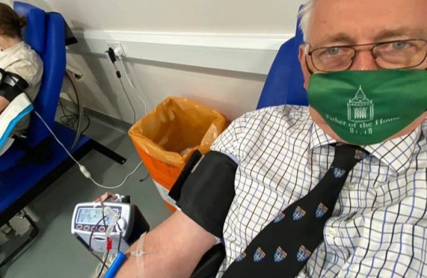 Sir Peter donating blood
