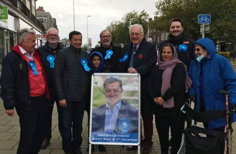 Sir Peter campaigning for prospective councillor Syed Ahmed