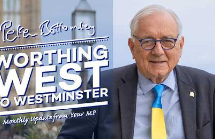 Sir Peter standing in front of Parliament