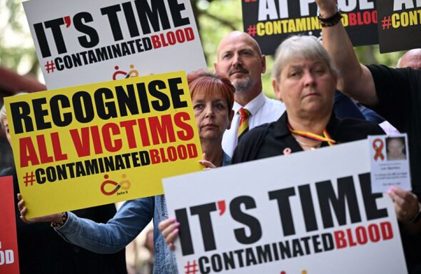 Photo of protesters at a rally for infected blood