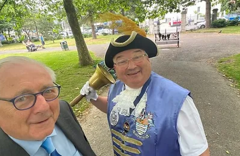 Sir Peter Bottomley with a member of the local community