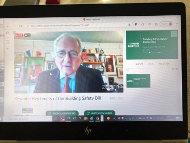 Sir Peter discussing the impacts of the Building Safety Bill on a video call