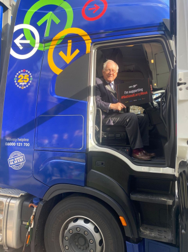 Sir Peter in the cab of a lorry