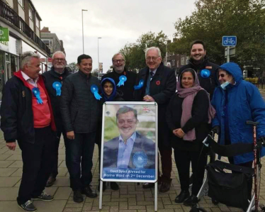 Sir Peter campaigning for prospective councillor Syed Ahmed