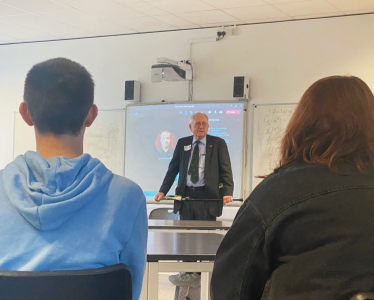 Sir Peter answering questions at Worthing College