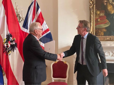 Sir Peter receiving his Austrian Grand Decoration of Honour in Gold