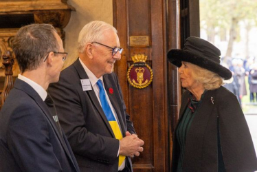 Sir Peter welcoming Her Majesty Queen Camilla to Westminster Abbey