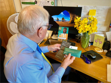 Sir Peter Bottomley doing a HIV test