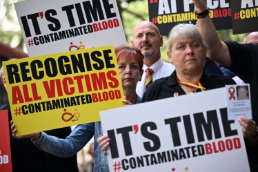 Photo of protesters at a rally for infected blood