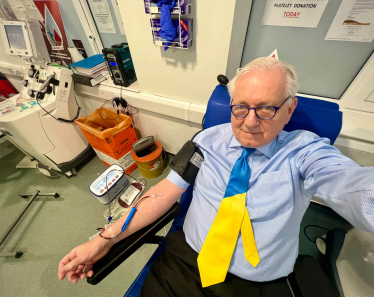 Sir Peter Bottomley donating blood