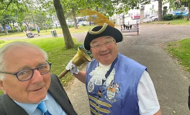 Sir Peter Bottomley with a member of the local community